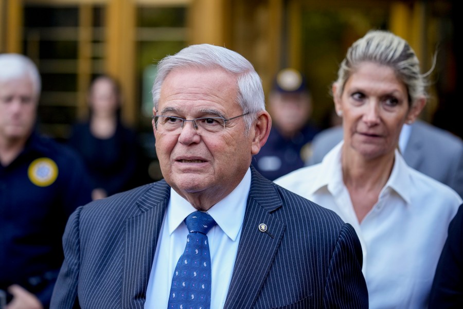 FILE - Sen. Bob Menendez and his wife, Nadine Menendez, leave federal court on Wednesday, Sept. 27, 2023, in New York. Federal prosecutors in New York City have rewritten their indictment against U.S. Sen Bob Menendez of New Jersey and his wife to charge them with conspiring to have him act as an agent of Egypt and Egyptian officials. The superseding indictment was filed in Manhattan federal court on Thursday, Oct. 12. (AP Photo/Seth Wenig, File)