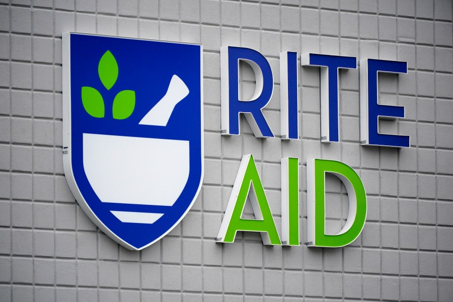 FILE - This photo shows a sign of Rite Aid on its store in Pittsburgh on Jan. 23, 2023. Rite Aid, a major U.S. pharmacy chain, said Sunday, Oct. 15, that it has filed for bankruptcy as part of its effort to restructure its finances. (AP Photo/Gene J. Puskar, File)