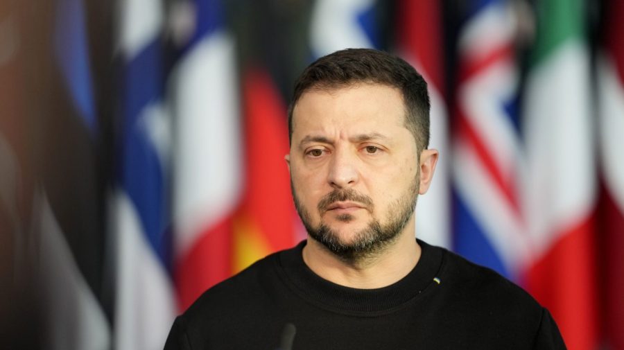 FILE - Ukraine's President Volodymyr Zelenskyy addresses a media conference prior to a meeting of NATO defense ministers at NATO headquarters in Brussels, Wednesday, Oct. 11, 2023. On Friday, Oct. 13, The Associated Press reported on stories circulating online incorrectly claiming a video shows a BBC News report confirming Ukraine provided weapons to Hamas. (AP Photo/Virginia Mayo, File)