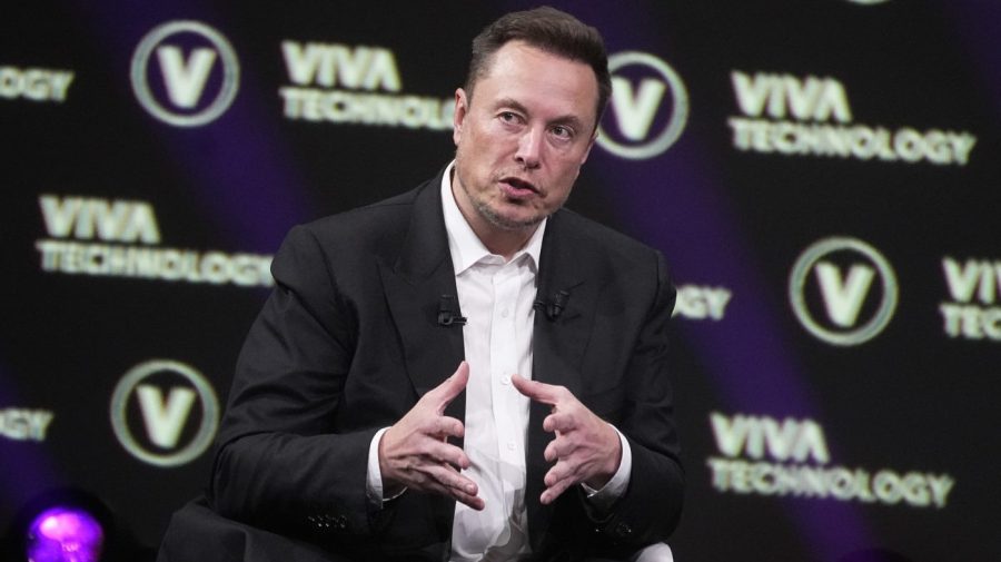 FILE - Elon Musk, who owns Twitter, Tesla and SpaceX, speaks at the Vivatech fair, June 16, 2023, in Paris. Elon Musk’s social media platform X has begun charging a $1 fee to new users in the Philippines and New Zealand. It's a test designed to cut down on the spam and fake accounts flourishing on the platform. (AP Photo/Michel Euler, File)