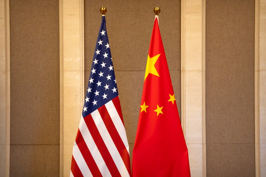 FILE - United States and Chinese flags are set up before a meeting between Treasury Secretary Janet Yellen and Chinese Vice Premier He Lifeng at the Diaoyutai State Guesthouse in Beijing, on July 8, 2023. China said the United States is the "biggest disruptor of regional peace and stability" in the world in a scathing response Wednesday, Oct. 25, 2023 to a Pentagon report on China's growing military buildup. (AP Photo/Mark Schiefelbein, Pool, File)