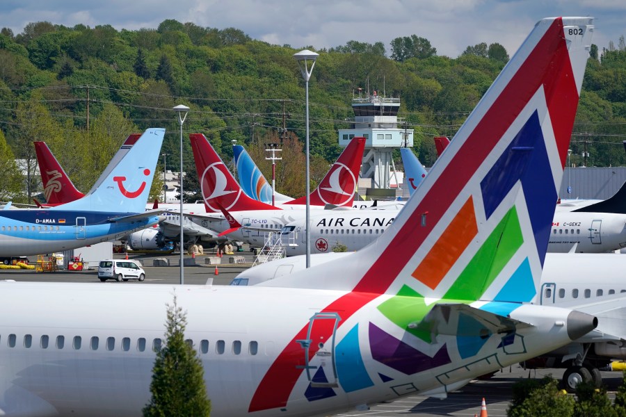 FILE - Boeing 737 Max airplanes sit parked in a storage lot, Monday, April 26, 2021, near Boeing Field in Seattle. Boeing reports earnings on Wednesday, Oct. 25, 2023. (AP Photo/Ted S. Warren)