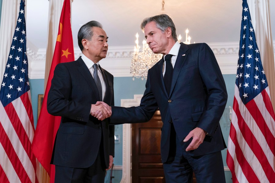 Secretary of State Antony Blinken shake hands with China's Foreign Minister Wang Yi after a bilateral meeting at the State Department in Washington, Thursday, Oct. 26, 2023. (AP Photo/Jose Luis Magana)