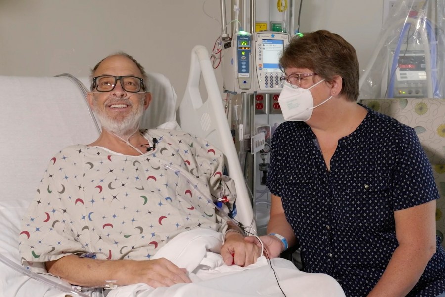 FILE - In this photo provided by the University of Maryland School of Medicine, Lawrence Faucette sits with wife, Ann, in the school's hospital in Baltimore, Md., in September 2023, before receiving a pig heart transplant. Lawrence Faucette, the second person to receive a transplanted heart from a pig has died, nearly six weeks after the highly experimental surgery, his doctors announced Tuesday, Oct. 31, 2023. (Mark Teske/University of Maryland School of Medicine via AP, File)