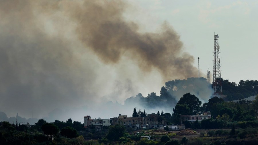 Smoke rises from an Israeli army position which was attacked by Hezbollah fighters near Alma al-Shaab, a Lebanese border village with Israel, south Lebanon, Sunday, Oct. 15, 2023. Hamas Palestinian militants in southern Lebanon fired 20 rockets into the northern Israeli towns of Schlomi and Nahariyya, the group said in a statement. They said it was "in response to the (Israeli) occupation's crimes against our people in Gaza".