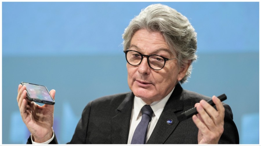 FILE - European Commissioner for Internal Market Thierry Breton speaks during a media conference on a common charging solution for mobile phones at EU headquarters in Brussels, Thursday, Sept. 23, 2021. European Union officials agreed Tuesday, June 7, 2022 on new rules requiring a uniform charging cord for smartphones and other devices, a move that would make life easier for consumers fed up with rummaging through a tangle of cables for the right one. (AP Photo/Thierry Monasse, File)