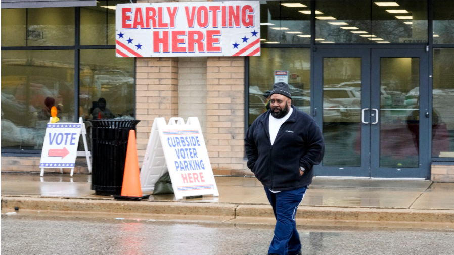 Dwayne Morgan walks away after casting an early ballot at a polling station Thursday, Feb. 9, 2023, in Milwaukee.