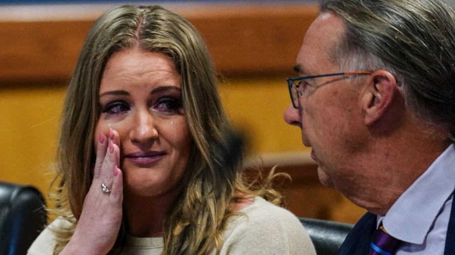 Jenna Ellis speaks with her attorney Franklin Houge after pleading guilty to a felony count of aiding and abetting false statements and writings inside Fulton Superior Court Judge Scott McAfee's Fulton County Courtroom, Tuesday, Oct. 24, 2023, in Atlanta.