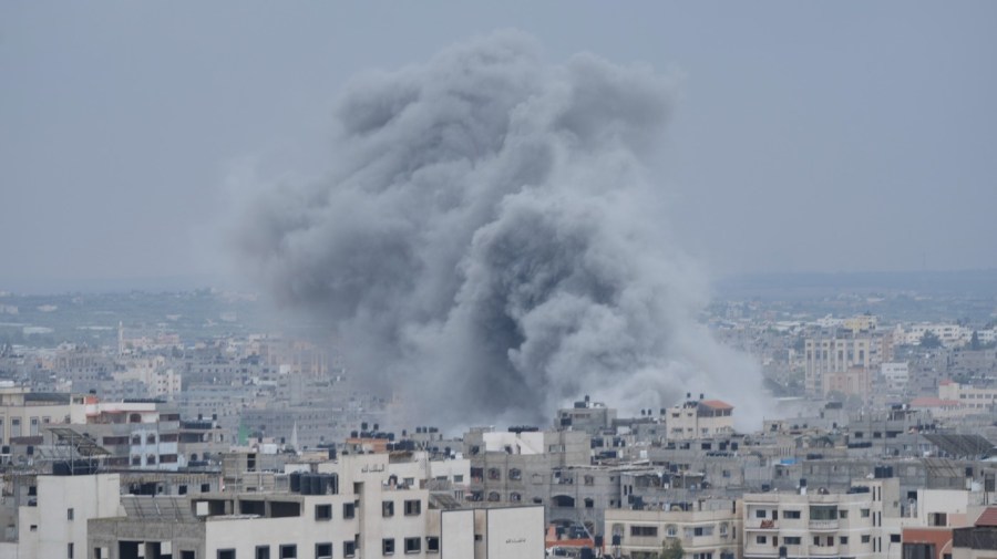 Smoke from an Israeli airstrike rises in Gaza City on Monday, Oct. 9, 2023.