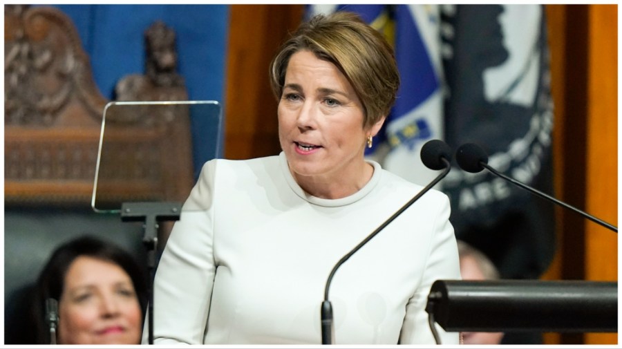 FILE - Massachusetts Gov. Maura Healey delivers her inaugural address in the House Chamber at the Statehouse moments after being sworn into office during inauguration ceremonies, Jan. 5, 2023, in Boston. On Thursday, Aug. 31, Healey activated up to 250 members of the Massachusetts National Guard to assist at shelters and hotels as the state struggles with a flood of migrants. (AP Photo/Steven Senne, File)