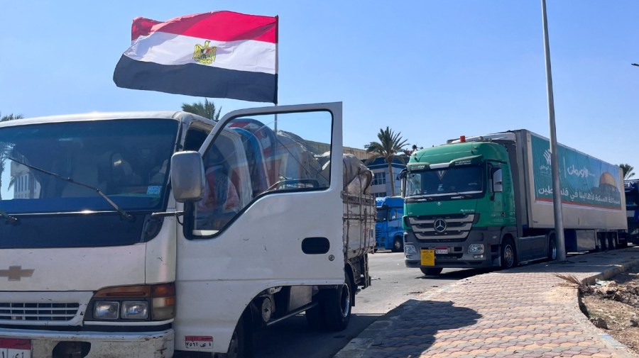 Humanitarian aid convoy for the Gaza Strip is parked in Arish, Egypt, Monday, Oct. 16, 2023. Hundreds of Palestinians in the Gaza Strip have fled their homes ahead of an expected Israeli ground invasion aimed at destroying Hamas after its fighters rampaged through southern Israel.