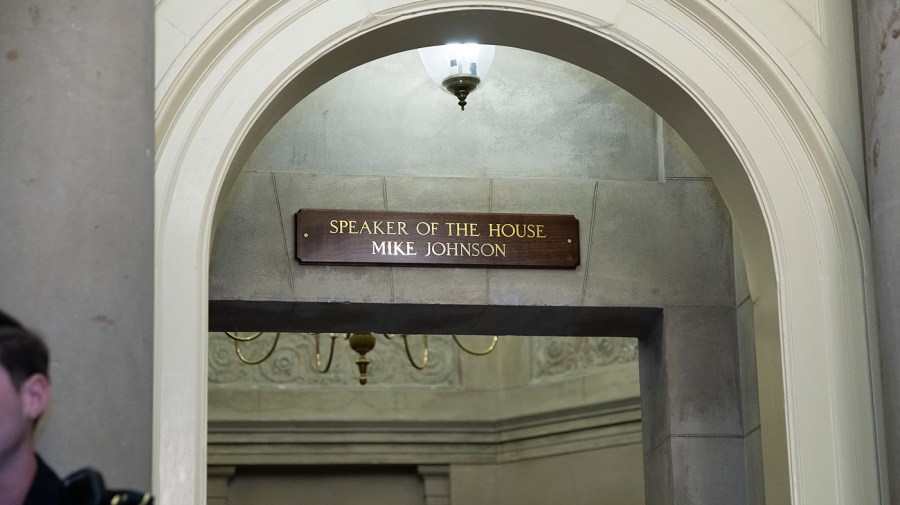 The sign for Rep. Mike Johnson (R-La.) is put up in the office of the Speaker following his election