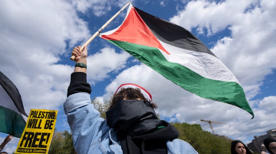 Pro-Palestinian demonstrators rally outside the White House in Washington, Sunday, Oct. 8, 2023.