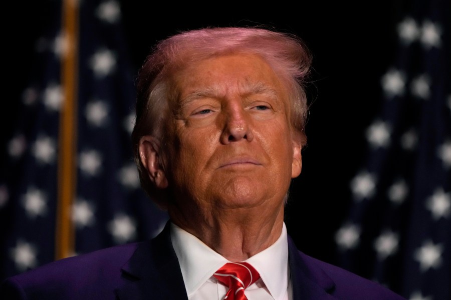 Former President Donald Trump arrives at a commit to caucus rally, Sunday, Oct. 29, 2023, in Sioux City, Iowa. (AP Photo/Charlie Neibergall)