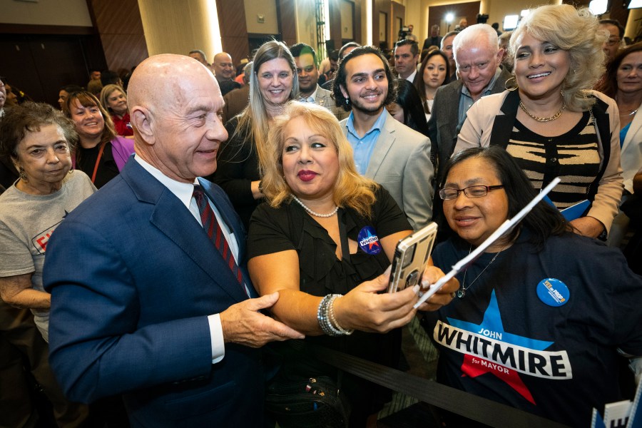 Mayoral candidate state Sen. John Whitmire takes photos with his supporters during an election watch party, Tuesday, Nov. 7, 2023, in Houston. (Brett Coomer/Houston Chronicle via AP)