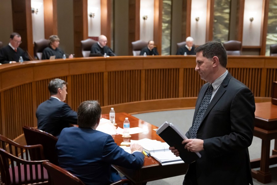 FILE - Ronald Fein, attorney for the petitioner, Free Speech for People, sits after arguing his case before the Minnesota Supreme Court Thursday, Nov. 2, 2023 St. Paul, Minn. The Minnesota Supreme Court on Wednesday, Nov. 8, 2023, dismissed a lawsuit seeking to bar former President Donald Trump from the 2024 primary ballot under a constitutional provision that forbids those who “engaged in insurrection” from holding office. (Glen Stubbe/Star Tribune via AP, Pool, File)