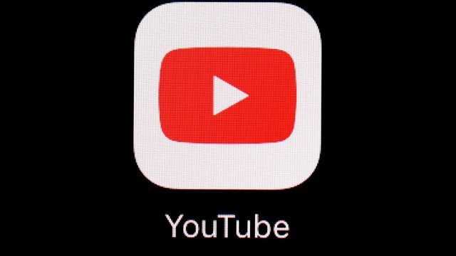 FILE - This March 20, 2018, file photo shows the YouTube app on an iPad in Baltimore. YouTube is rolling out new rules for AI content, Tuesday, Nov. 14, 2023, including requiring creators to reveal whether they've used generative artificial intelligence to make realistic looking videos. (AP Photo/Patrick Semansky, File)