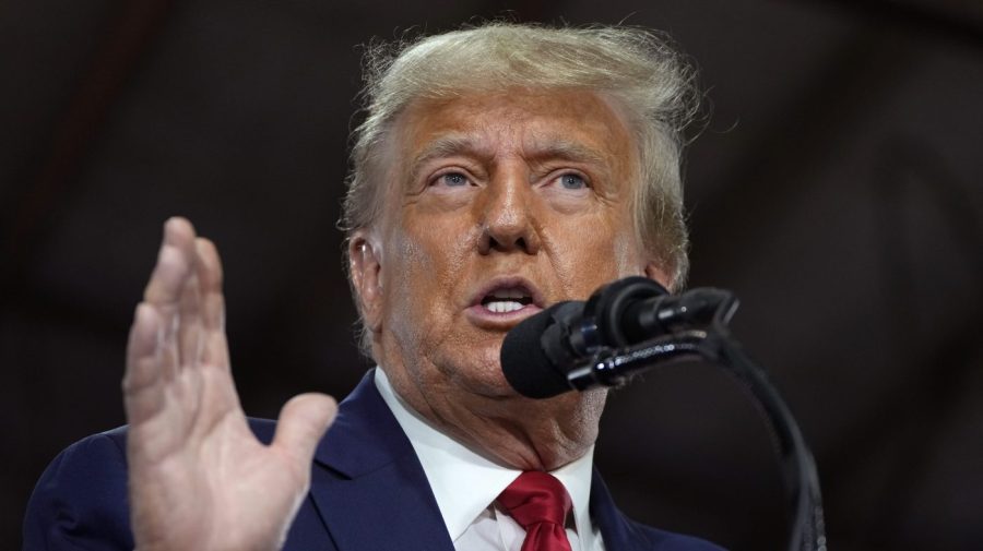 FILE - Former President Donald Trump speaks during a commit to caucus rally, Monday, Oct. 16, 2023, in Adel, Iowa. Trump is scheduled to speak at a commitment to caucus event in Nevada on Saturday, Oct. 28. (AP Photo/Charlie Neibergall, File)