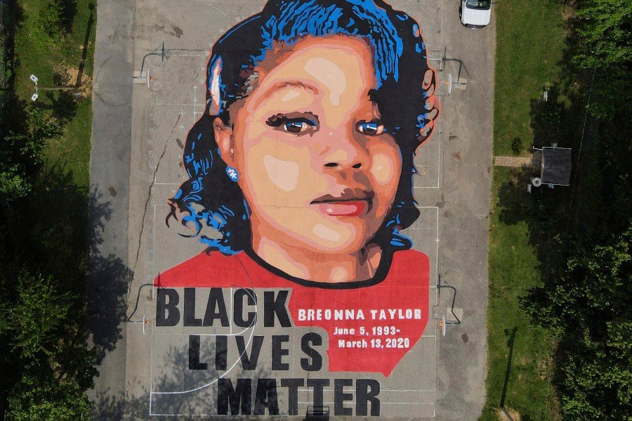 FILE - A ground mural depicting a portrait of Breonna Taylor is seen at Chambers Park in Annapolis, Md., July 6, 2020. Jurors failed to reach a unanimous verdict on federal civil rights charges Thursday, Nov. 16, 2023 in the trial of a former Louisville police officer charged in Breonna Taylor’s death, prompting the judge to declare a mistrial. (AP Photo/Julio Cortez, File)