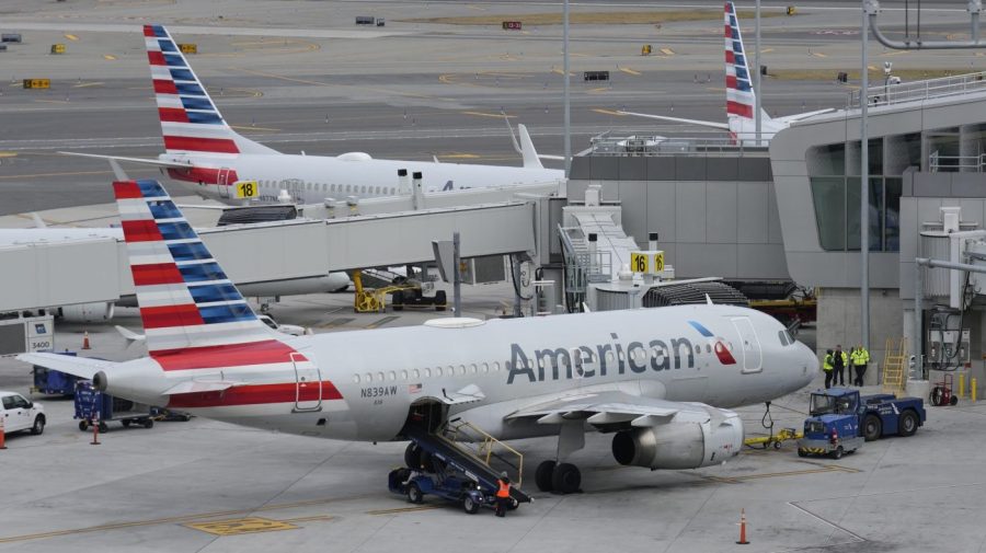 American Airlines planes are seen on the tarmac.