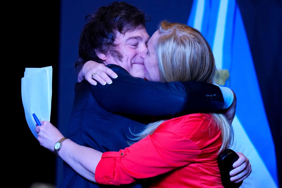 Javier Milei, presidential candidate of the Liberty Advances coalition, embraces his sister Karina Milei after being elected president in a runoff election in Buenos Aires, Argentina, Sunday, Nov. 19, 2023. (AP Photo/Natacha Pisarenko)