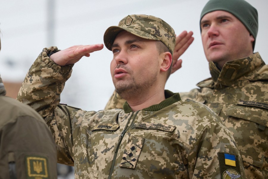 FILE - Maj. Gen. Kyrylo Budanov, Ukraine's military intelligence chief, center, attends a commemorative event on the occasion of the Russia Ukraine war one year anniversary in Kyiv, Ukraine, on Feb. 24, 2023. The wife of Ukraine’s intelligence chief has been diagnosed with heavy metals poisoning and is undergoing treatment in a hospital, a spokesperson for the agency said Tuesday Nov. 28, 2023. Marianna Budanova is the wife of Kyrylo Budanov, the head of Ukraine’s military intelligence agency known by its local acronym GUR. Her poisoning was confirmed to The Associated Press by Andrii Yusov, the agency's spokesman. (Ukrainian Presidential Press Office via AP, File)