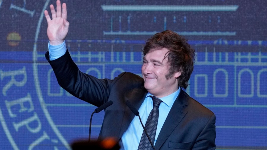 Presidential candidate of the Liberty Advances coalition Javier Milei waves during his victory speech after being elected president in a runoff election in Buenos Aires, Argentina, Sunday, Nov. 19, 2023.