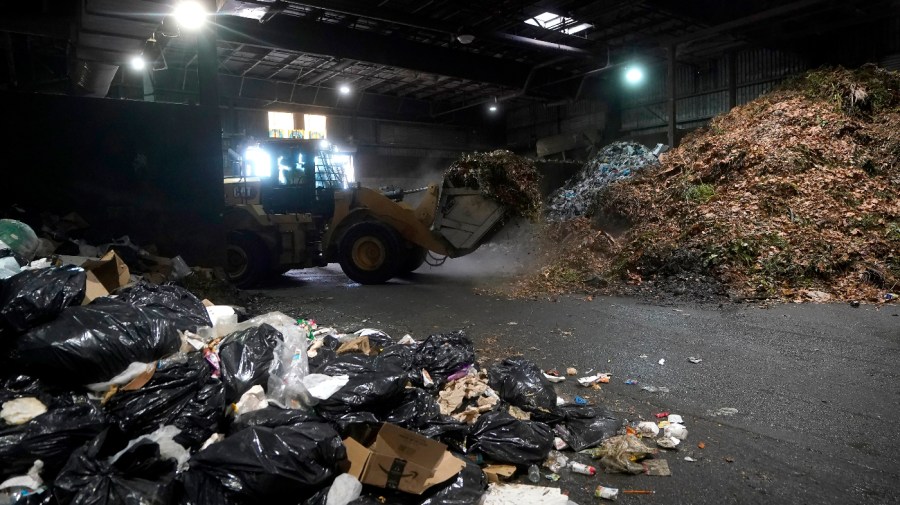 Organic material is picked up to be loaded onto a truck at a GreenWaste Renewable Energy Digestion Facility in San Jose, Calif., Friday, Oct. 27, 2023.