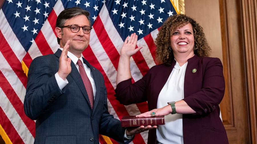 Speaker Mike Johnson (R-la.) and Rep. Celeste Maloy (R-Utah) participate in a ceremonial swearing in for press