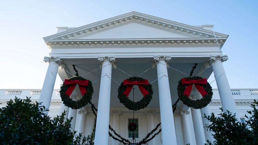 The White House in Washington, D.C., is seen from the North Lawn during a press preview of the holiday decorations