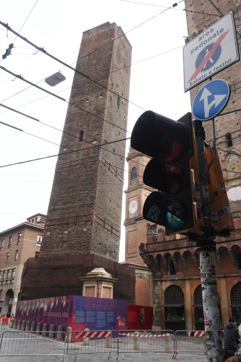 The Garisenda medieval tower is pictured in Bologna, Italy, Wednesday, Oct. 25, 2023. Bologna's Garisenda tower has been locked down for fear it could collapse. Authorities have provided a security cordon in case of collapse.The Garisenda tower along with the Asinelli(97meters)tower is one of the beauties and attractions for tourists visiting Bologna, and a landmark for citizens. (Michele Nucci, Lapresse Via AP)