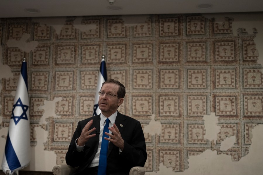 Israel's President Isaac Herzog speaks during an interview at his official residence in Jerusalem, Thursday, Dec. 14, 2023. (AP Photo/Maya Alleruzzo)