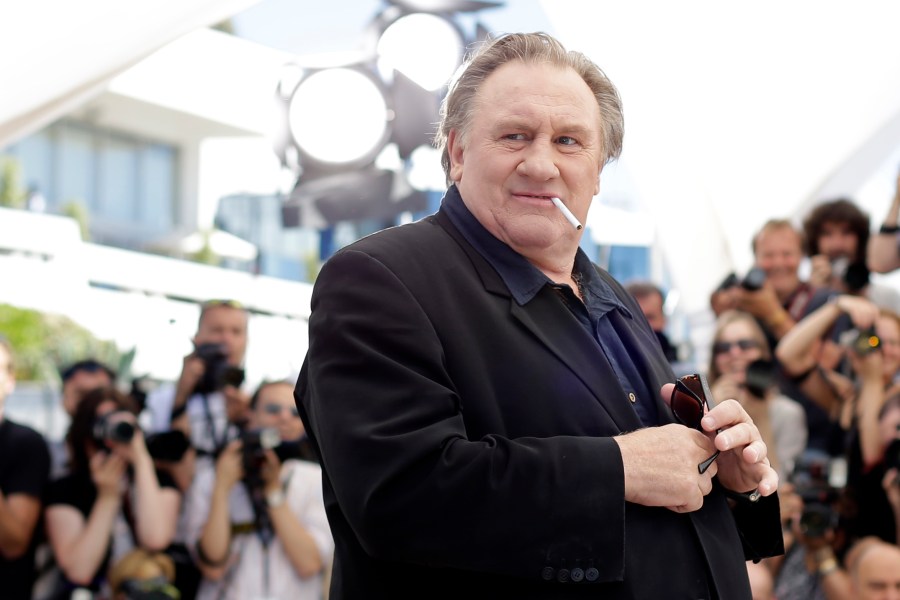 FILE - Actor Gerard Depardieu poses for photographers during a photo call for the film Valley of Love, at the 68th international film festival, Cannes, southern France, Friday, May 22, 2015. The Grevin Museum of waxworks in Paris has removed the wax figure of French actor Gerard Depardieu due to negative reactions from visitors, the museum said Monday. (AP Photo/Thibault Camus, File)