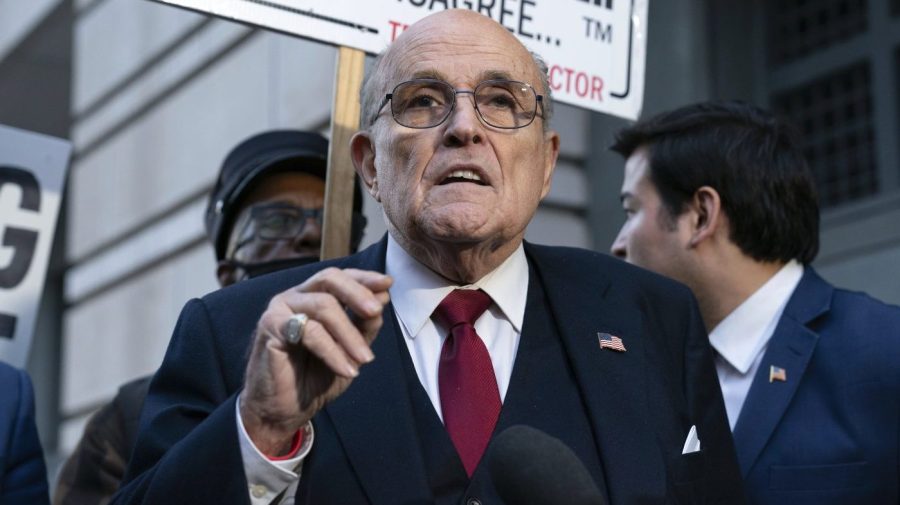 FILE - Former Mayor of New York Rudy Giuliani speaks during a news conference outside the federal courthouse in Washington, Friday, Dec. 15, 2023. A jury awarded $148 million in damages on Friday to two former Georgia election workers who sued Giuliani for defamation over lies he spread about them in 2020 that upended their lives with racist threats and harassment. (AP Photo/Jose Luis Magana, File)