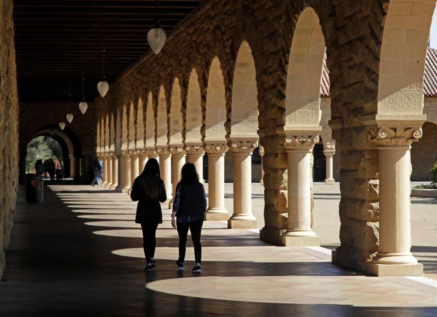 FILE - Students walk on the Stanford University campus on March 14, 2019, in Stanford, Calif. Hidden inside the foundation of popular artificial intelligence image-generators are thousands of images of child sexual abuse, according to a new report from the Stanford Internet Observatory that urges technology companies to take action to address a harmful flaw in the technology they built. (AP Photo/Ben Margot, File)