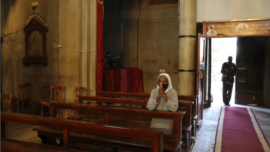 Sudanese Christians celebrate Christmas mass in Khartoum, Sudan, Friday, Dec. 25, 2020.