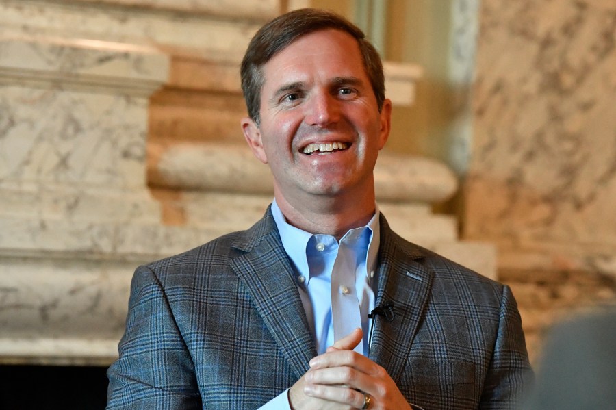 FILE - Kentucky Gov. Andy Beshear reacts to a question during an interview in the State Reception Room of the state Capitol, Nov. 8, 2023, in Frankfort, Ky. Access to medical marijuana in Kentucky should expand to include a longer list of severe health conditions, Gov. Beshear said Thursday, Jan. 4, 2024, in advocating a change that would make hundreds of thousands more people eligible for treatment when the program begins next year. (AP Photo/Timothy D. Easley, File)