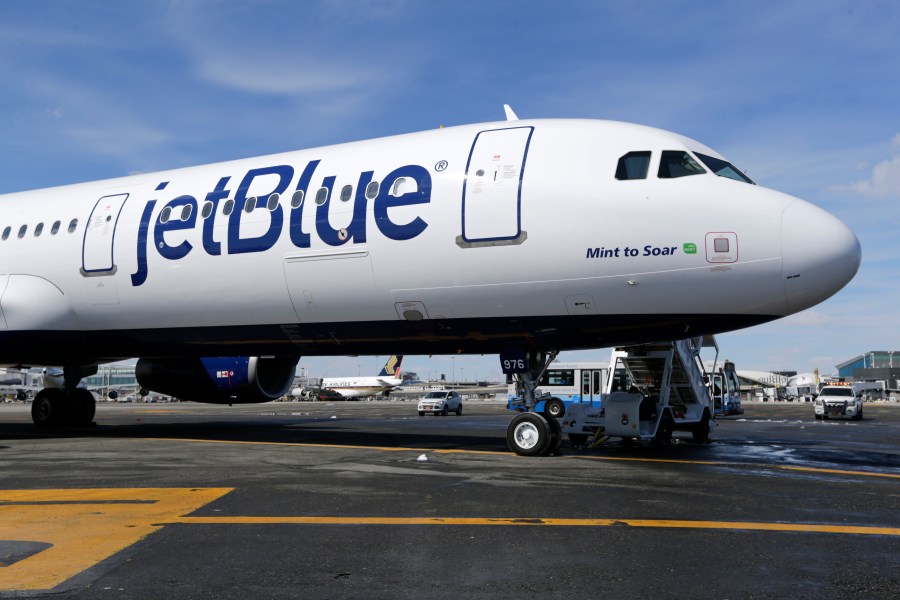 FILE - A JetBlue airplane is shown at John F. Kennedy International Airport in New York, March 16, 2017. JetBlue said Monday, Jan. 8, 2024, that CEO Robin Hayes will step down next month and be replaced by the airline’s president, Joanna Geraghty, who will be the first woman to lead a major U.S. carrier. (AP Photo/Seth Wenig, File)