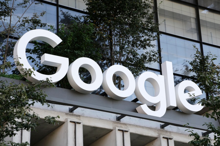 FILE - The Google sign is shown over an entrance to the company's new building in New York on Wednesday, Sept. 6, 2023. A legal advisor to the European Union's top court said Thursday that Google should still pay a whopping fine in a long-running antitrust case in which regulators found the company gave its own shopping recommendations an illegal advantage over rivals in search results. (AP Photo/Peter Morgan, File)