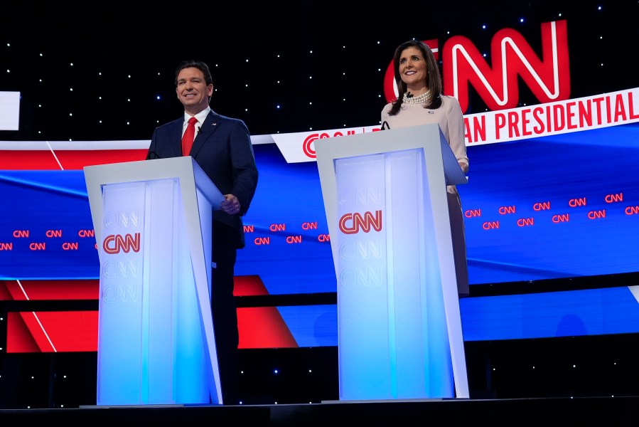 Former UN Ambassador Nikki Haley and Florida Gov. Ron DeSantis appear at the CNN Republican presidential debate at Drake University in Des Moines, Iowa, Wednesday, Jan. 10, 2024. (AP Photo/Charlie Neibergall)