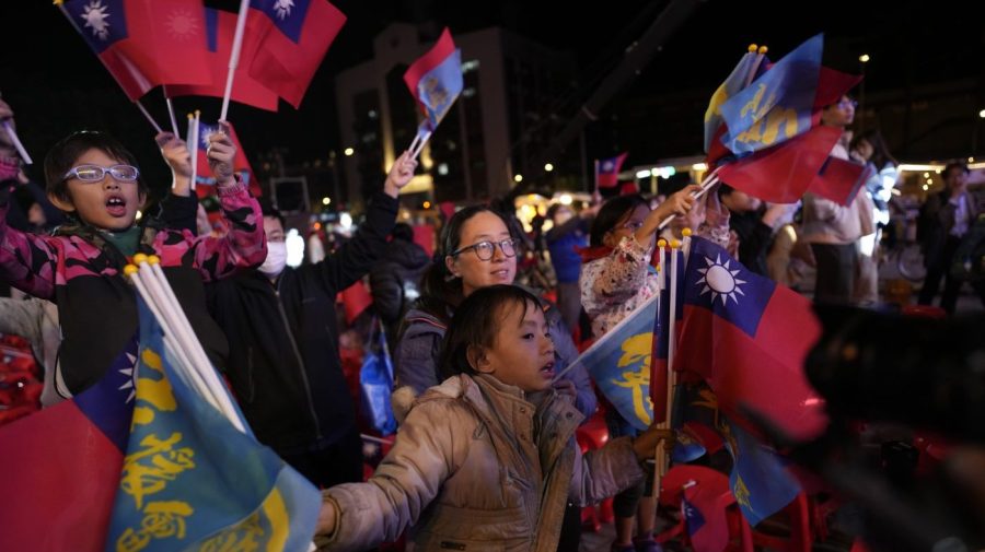 Kuomintang (KMT) party supporters react after their presidential candidate Hou Yu-ih conceded defeat in New Taipei City, Taiwan, Saturday, Jan. 13, 2024. In his concession speech, Hou apologized for "not working hard enough" to regain power for the KMT, which ran Taiwan under martial law for nearly four decades before democratic reforms in the 1980s. (AP Photo/Ng Han Guan)