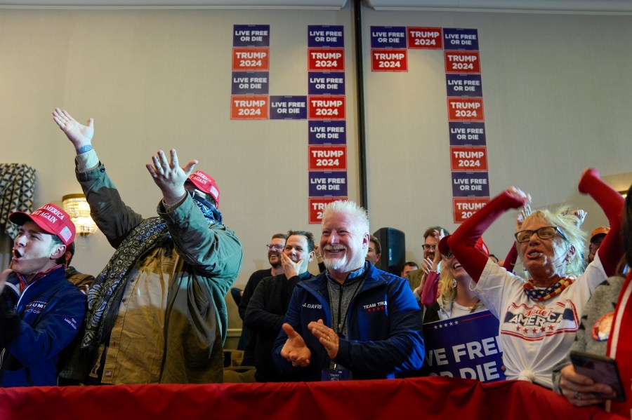 Supporters listen as Republican presidential candidate former President Donald Trump speaks at a campaign event in Concord, N.H., Friday, Jan. 19, 2024. (AP Photo/Matt Rourke)