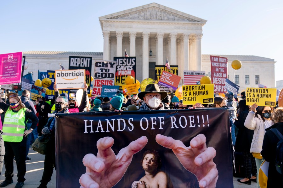 FILE - Abortion rights advocates and anti-abortion protesters demonstrate in front of the U.S. Supreme Court, Dec. 1, 2021, in Washington. There's action on abortion policy in rulings, legislatures, and campaigns for candidates and ballot measures on the 51st anniversary of Roe v. Wade. The 1973 ruling established the right to abortion across the U.S. But things have been in flux since the U.S. Supreme Court overturned it in 2022. (AP Photo/Andrew Harnik, File)