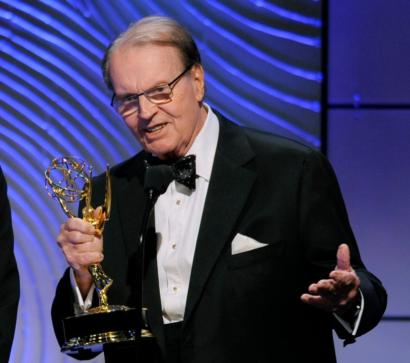 FILE - Charles Osgood accepts the award for outstanding morning program for "CBS Sunday Morning" at the 40th Annual Daytime Emmy Awards on June 16, 2013, in Beverly Hills, Calif. Osgood, who anchored the popular news magazine's for more than two decades, was host of the long-running radio program “The Osgood File” and was referred to as CBS News’ poet-in-residence, has died. He was 91. (Photo by Chris Pizzello/Invision/AP, File)