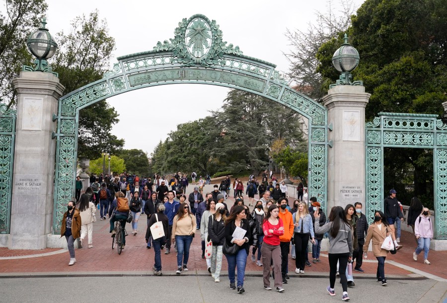 File - Students make their way through the Sather Gate near Sproul Plaza on the University of California, Berkeley, campus March 29, 2022, in Berkeley, Calif. The Free Application for Federal Student Aid is available for the 2024-2025 school year, three months later than usual. (AP Photo/Eric Risberg, File)