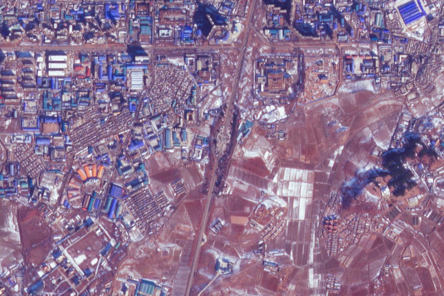 This satellite image from Planet Labs PBC appears to show the Pyongyang's Monument to the Three Charters for National Reunification, which was also commonly called the Arch of Reunification, destroyed in Pyongyang, North Korea, Tuesday, Jan. 23, 2024. The monument appears to have been destroyed as tensions on the Korean Peninsula have increased in recent months and as North Korean leader Kim Jong Un called the monument an "eyesore." (Planet Labs PBC via AP)