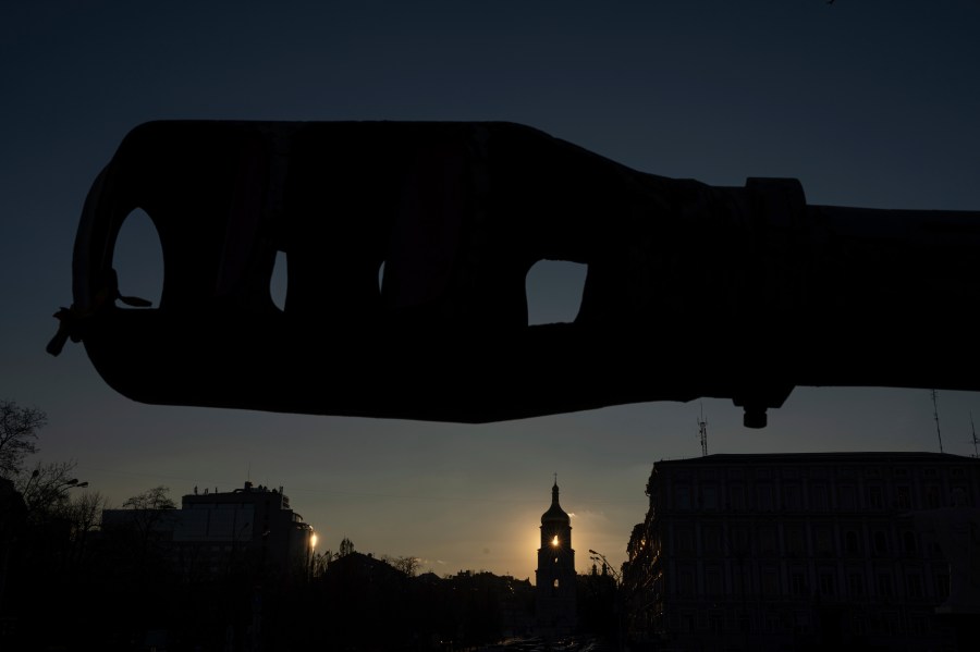 A bell tower of the Saint Sophia Cathedral is seen through the destroyed Russian artillery cannon in downtown Kyiv, Ukraine, on Monday, Jan. 29, 2024. (AP Photo/Evgeniy Maloletka)