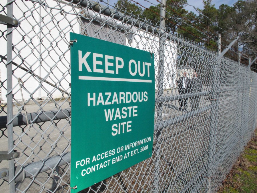 FILE - In a Feb. 27, 2013 file photo, a sign cautions visitors outside a "pump and treat" facility on the Marine base at Camp Lejeune, N.C. Military personnel stationed at Camp Lejeune from 1975 to 1985 had at least a 20% higher risk for a number of cancers than those stationed elsewhere, federal health officials said Wednesday, Jan. 31, 2024, in a long-awaited study of the North Carolina base's contaminated drinking water. (AP Photo/Allen Breed, File)