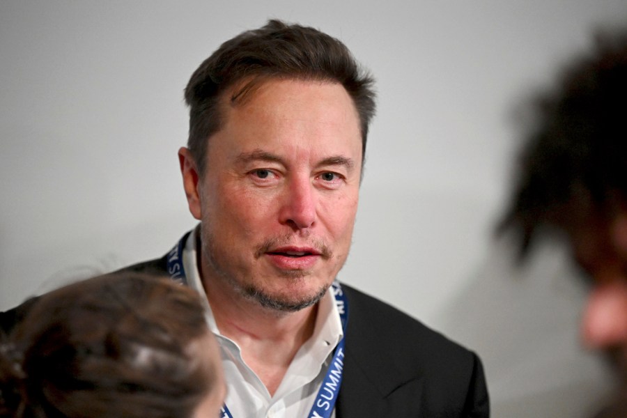 File - Tesla CEO Elon Musk attends the first plenary session of the AI Safety Summit at Bletchley Park, on Nov. 1, 2023 in Bletchley, England. A Delaware judge this week invalidated Elon Musk's $55.8 billion Tesla pay package, saying it is too big and that Musk set the terms with a complaint board. (Leon Neal/Pool Photo via AP, File)