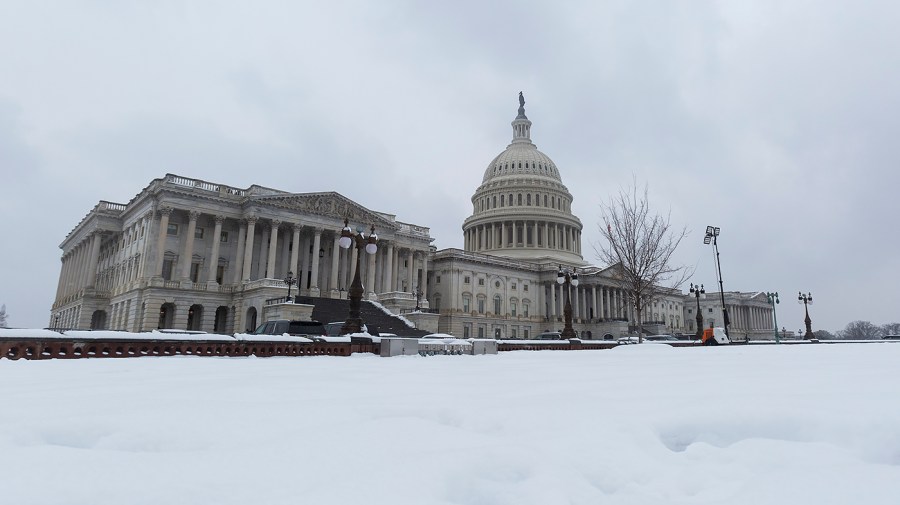 The U.S. Capitol in Washington, D.C., is seen from the East Front Lawn after a snow storm